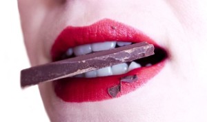 biting chocolate